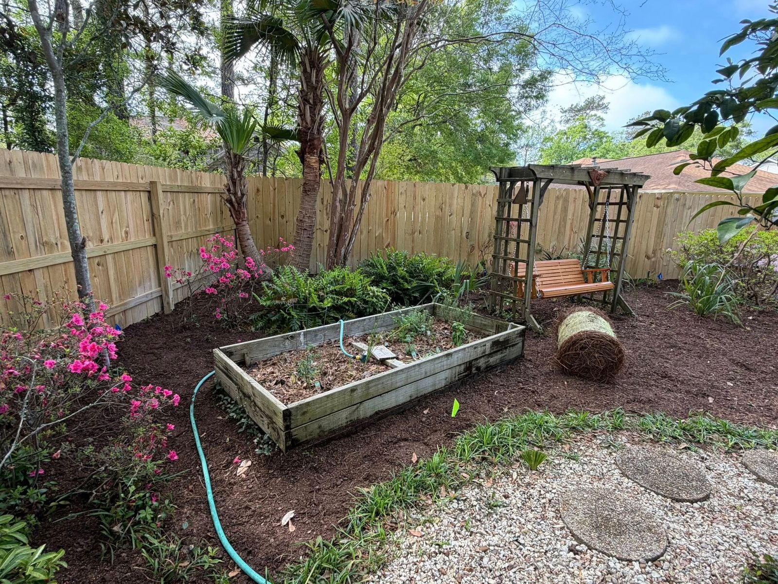 Completed landscape design with fresh plantings and beds on a Northshore property